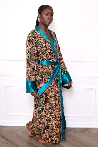Woman wearing a long cheetah print robe